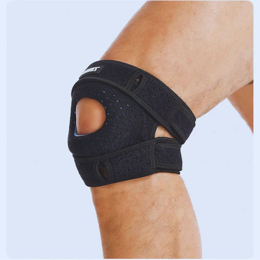 Sportif amateur montant des marches avec une genouillère rotulienne anti-tendinite pour soulager une douleur au genou.