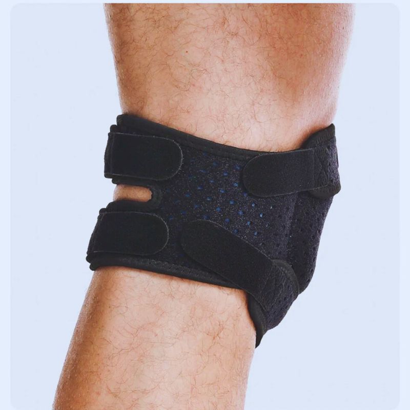 Homme en course légère portant une genouillère rotulienne pour stabiliser la rotule et réduire les tensions tendineuses.