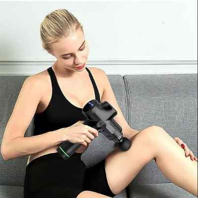 Pistolet de massage VibraTherapy pour une dét — en utilisation douleur cheville sport sportif